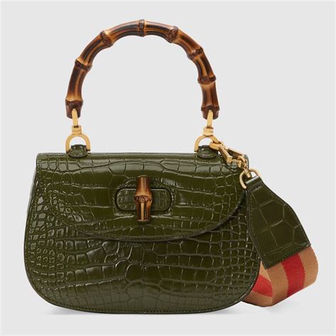 borsa gucci coccodrillo con manico bambu 29.000 euro|Borsa a mano Zumi in coccodrillo misura media di Gucci in Green.